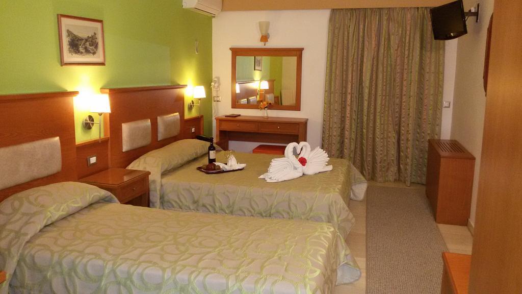 تولو Paradise Lost Hotel-Apartments الغرفة الصورة